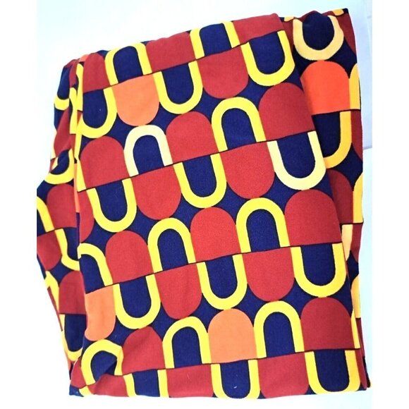 Lularoe Tall & Curvy Leggings Crazy print in orange, rust, yellow on Navy Ground - Picture 1 of 2
